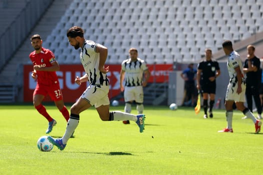 Nicolas Vouilloz (FC Basel) is one step faster ahead of the onrushing Vincenzo Grifo (SC Freiburg) in the football test match: SC Freiburg - FC Basel  REGULATIONS PROHIBIT ANY USE OF PHOTOGRAPHS AS IMAGE SEQUENCES AND/OR QUASI-VIDEONann  Photo: Joachim Hahne/johapress