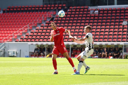 Maximilian Eggestein (SC Freiburg) wins the header duel against Fabian Frei (FC Basel) in the football test match: SC Freiburg - FC Basel  REGULATIONS PROHIBIT ANY USE OF PHOTOGRAPHS AS IMAGE SEQUENCES AND/OR QUASI-VIDEONann  Photo: Joachim Hahne/johapress