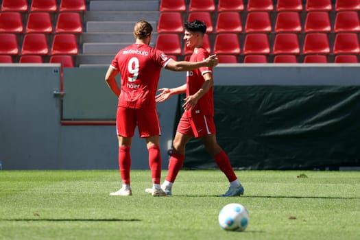Lucas Höler (SC Freiburg) congratulates goalscorer Marco Wörner (SC Freiburg) on the 2-0 win in the friendly match: SC Freiburg - FC Basel  REGULATIONS PROHIBIT ANY USE OF PHOTOGRAPHS AS IMAGE SEQUENCES AND/OR QUASI-VIDEONann  Photo: Joachim Hahne/johapress