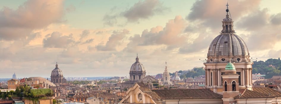 Rome, Italy. Urban landscape, blue sky with clouds, church exterior architecture.