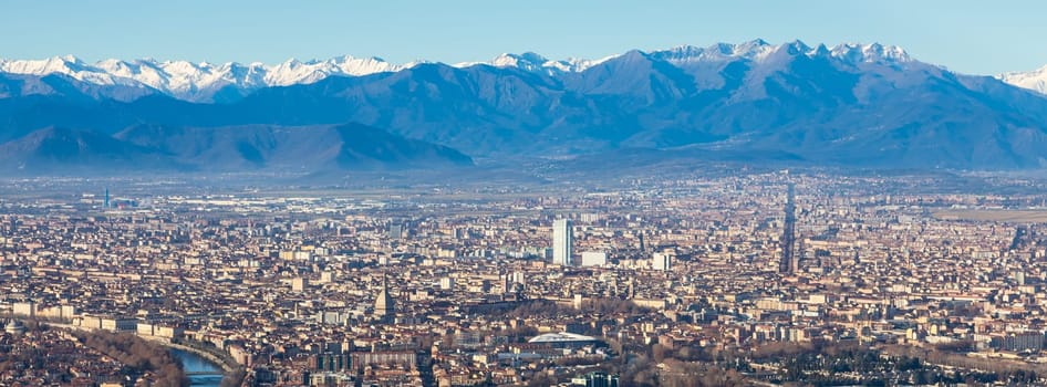 Turin, Italy - 24 December 2023: panoramic view with Alps and blue sky