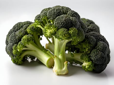 Green broccoli on the white