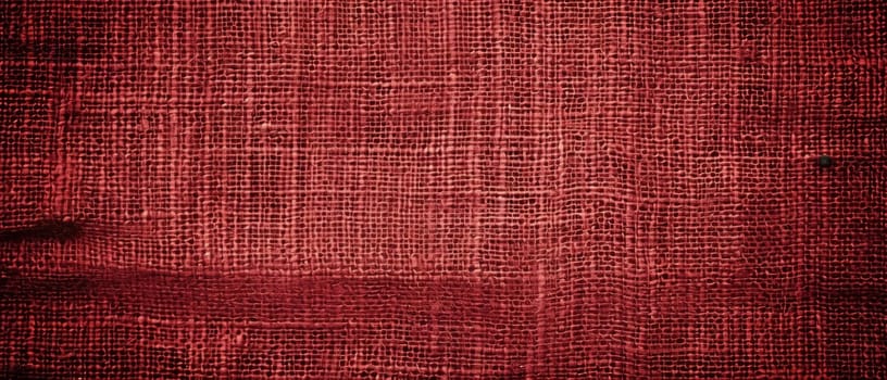 Seamless textured red fabric, ideal for backgrounds with a sense of uniformity and subtle complexity