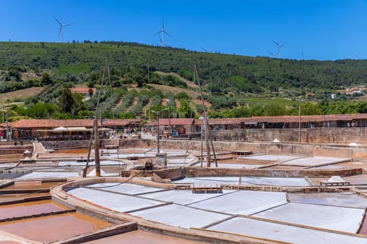 Rio Maior, Portugal: July 7, 2024: Fonte da Bica Salt Flats, aka Salinas de Rio Maior, system of shallow water compartments and gutters for salt extraction, Portugal