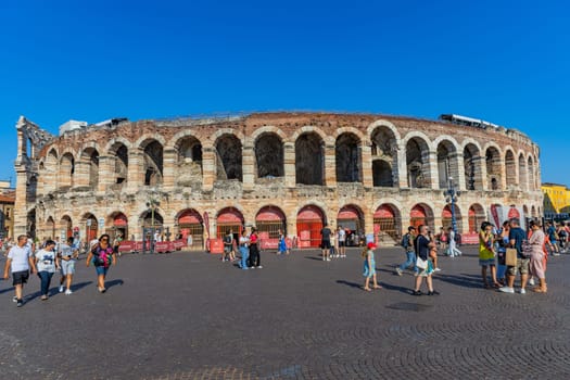 Verona, Italy: July 12, 2024: The Verona Arena in Piazza Bra square. Roman amphitheatre Arena di Verona ancient building, sunny day, historical city centre
