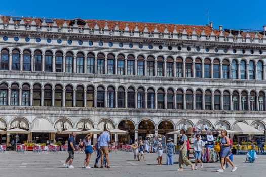 Venice, Italy - July 26, 2024: Tourists on San Marco square. Venice is very popular tourist destination. Venice, Italy