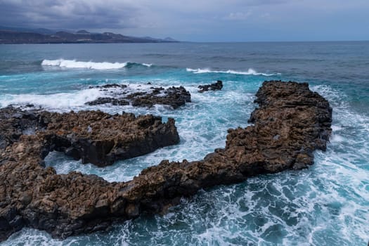 El Confital beach on the edge of Las Palmas, La Isleta peninsula. Gran Canaria, Spain