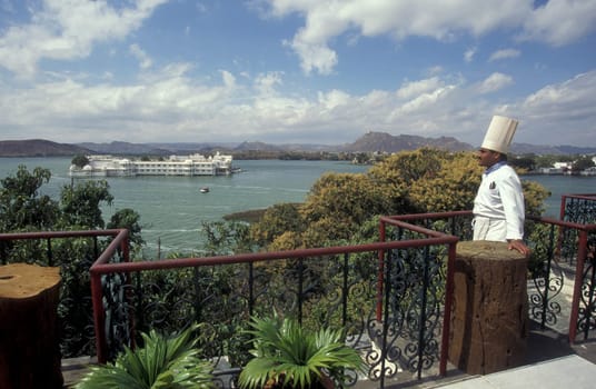 a view of the Jagmandir Palace on the Pichhola Lake in the Town of Udaipur in the Province of Rajasthan in India.  India, Udaipur, January, 1998