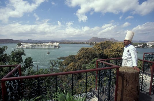 a view of the Jagmandir Palace on the Pichhola Lake in the Town of Udaipur in the Province of Rajasthan in India.  India, Udaipur, January, 1998
