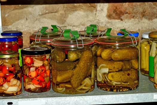pickled cucumbers and chilis in a German cellar in autumn