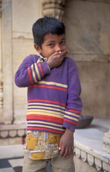 a portrait of a Boy in the Town of Jaisalmer in the Province of Rajasthan in India.  India, Jaisalmer, January, 1998