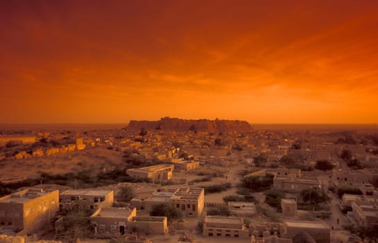 a view of the Jaisalmer Fort with the city of Jaisalmer in the Province of Rajasthan in India.  India, Jaisalmer, January, 1998