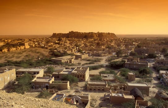 a view of the Jaisalmer Fort with the city of Jaisalmer in the Province of Rajasthan in India.  India, Jaisalmer, January, 1998