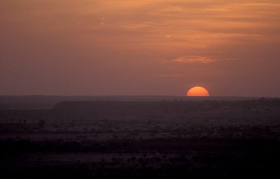 a sunset in the Thar Desert near the Town of Jaisalmer in the Province of Rajasthan in India.  India, Jaisalmer, January, 1998