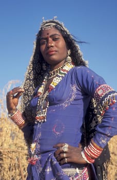 a portrait of a Rajasthani women in the Town of Jaisalmer in the Province of Rajasthan in India.  India, Jaisalmer, January, 1998