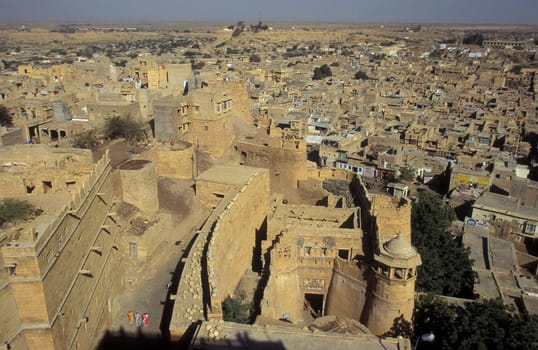 a view of the Jaisalmer Fort with the city of Jaisalmer in the Province of Rajasthan in India.  India, Jaisalmer, January, 1998