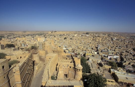a view of the Jaisalmer Fort with the city of Jaisalmer in the Province of Rajasthan in India.  India, Jaisalmer, January, 1998