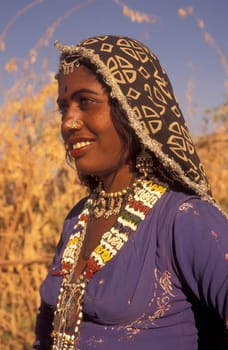 a portrait of a Rajasthani women in the Town of Jaisalmer in the Province of Rajasthan in India.  India, Jaisalmer, January, 1998