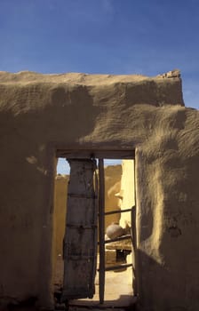a old Stone House near the Town of Jaisalmer in the Province of Rajasthan in India.  India, Jaisalmer, January, 1998