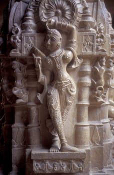a stone carving figure inside oft the Jain Temple in the Jaisalmer Fort in the city of Jaisalmer in the Province of Rajasthan in India.  India, Jaisalmer, January, 1998