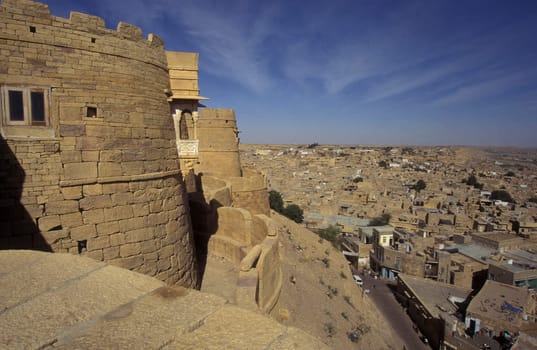 a view of the Jaisalmer Fort with the city of Jaisalmer in the Province of Rajasthan in India.  India, Jaisalmer, January, 1998