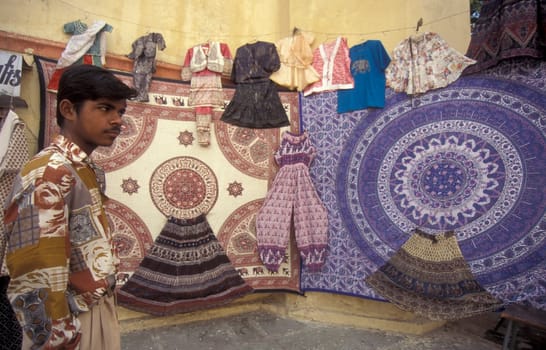 a indian textile and clothes shop in the City of Jaipur in the Province of Rajasthan in India.  India, Jaipur, January, 1998