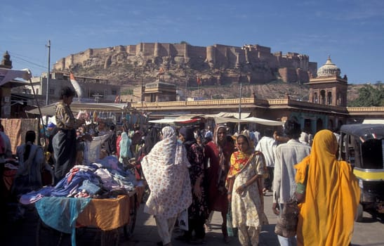 a streetmarket at a square in the city of Jaisalmer in the Province of Rajasthan in India.  India, Jaisalmer, January, 1998
