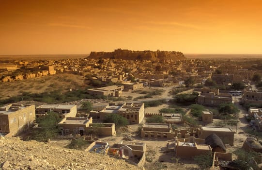 a view of the Jaisalmer Fort with the city of Jaisalmer in the Province of Rajasthan in India.  India, Jaisalmer, January, 1998