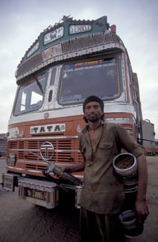 a public Bus driver at a Busstation in the Town of Jaisalmer in the Province of Rajasthan in India.  India, Jaisalmer, January, 1998