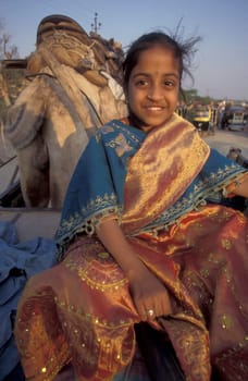 a portrait of a Rajasthani women in the Town of Jaisalmer in the Province of Rajasthan in India.  India, Jaisalmer, January, 1998