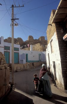 a alley in the old Town with the Jaisalmer Fort in the city of Jaisalmer in the Province of Rajasthan in India.  India, Jaisalmer, January, 1998