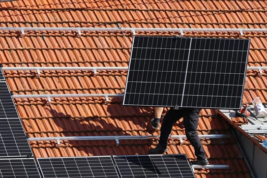 Installation of a photovoltaic system on a house roof