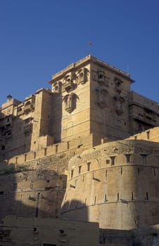 a view of the Jaisalmer Fort in the old Town of Jaisalmer in the Province of Rajasthan in India.  India, Jaisalmer, January, 1998