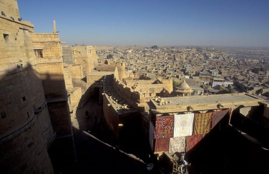 a view of the Jaisalmer Fort with the city of Jaisalmer in the Province of Rajasthan in India.  India, Jaisalmer, January, 1998