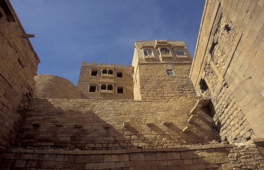 a view of the Jaisalmer Fort in the old Town of Jaisalmer in the Province of Rajasthan in India.  India, Jaisalmer, January, 1998