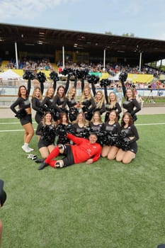Tim Mälzer and the HSV cheerleaders,kicking the charity football match for the benefit of the UKE children's ward in the stadium of SC Victoria,Hamburg,08.09.2024