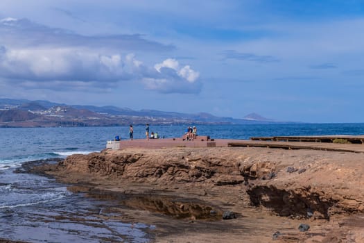Gran Canaria, Spain: March 3, 2024: People at el Confital beach on the edge of Las Palmas, La Isleta peninsula. Gran Canaria, Spain