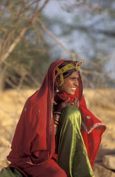 a portrait of a Rajasthani women in the Town of Jaisalmer in the Province of Rajasthan in India.  India, Jaisalmer, January, 1998