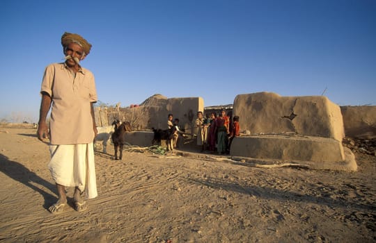 Old Rajasthani Men in a small Village near the Town of Bikaner in the Province of Rajasthan in India.  India, Bikaner, January, 1998