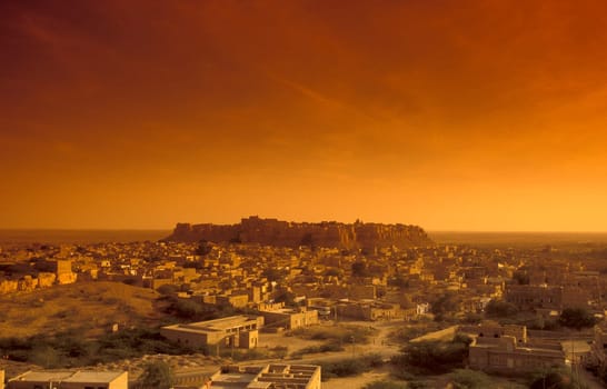 a view of the Jaisalmer Fort with the city of Jaisalmer in the Province of Rajasthan in India.  India, Jaisalmer, January, 1998