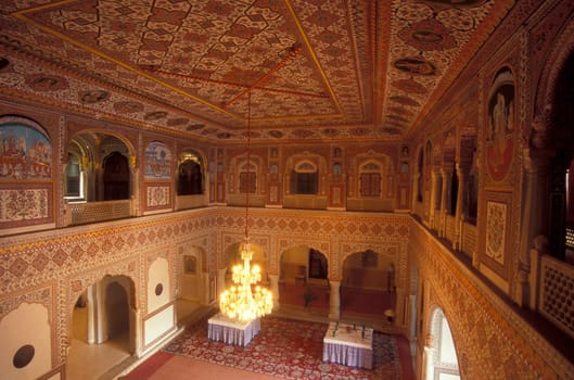 Inside the Samode Palace Hotel near the City of Jaipur in the Province of Rajasthan in India.  India, Jaipur, January, 1998