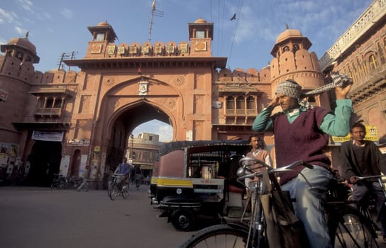 a City wall Gate in the old town of Jaipur in the province of Rajasthan in India.  India, Jaipur, January, 1998