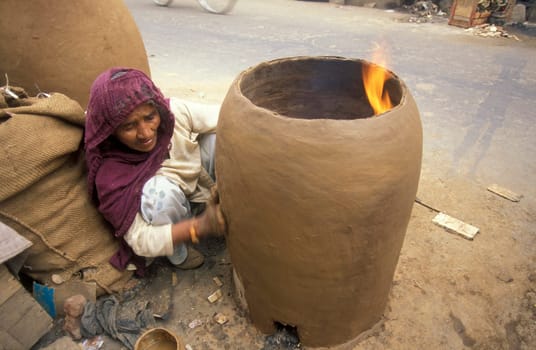 Working People in a Pottery Factory in the City of Jaipur in the Province of Rajasthan in India.  India, Jaipur, January, 1998