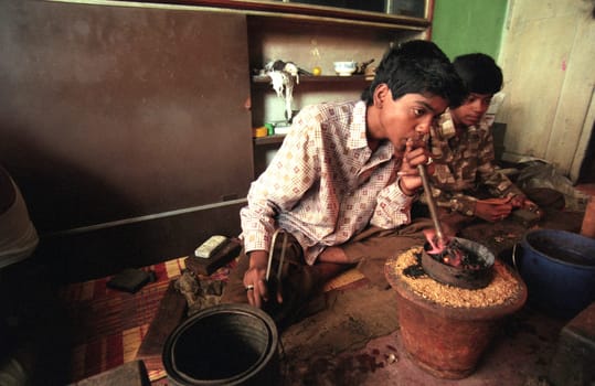 Working People in a Jewelry Factory in the City of Jaipur in the Province of Rajasthan in India.  India, Jaipur, January, 1998