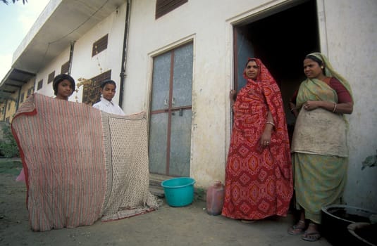 Working People in a textile coloring and dryeing Factory in the City of Jaipur in the Province of Rajasthan in India.  India, Jaipur, January, 1998