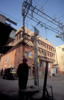a House and Palace a road in the City of Jaipur in the Province of Rajasthan in India.  India, Jaipur, January, 1998