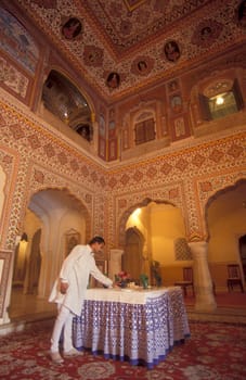 Inside the Samode Palace Hotel near the City of Jaipur in the Province of Rajasthan in India.  India, Jaipur, January, 1998