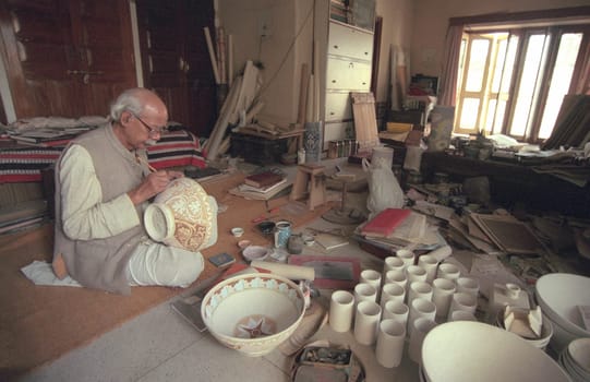 Working People in a Pottery Factory in the City of Jaipur in the Province of Rajasthan in India.  India, Jaipur, January, 1998