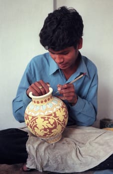 Working People in a Pottery Factory in the City of Jaipur in the Province of Rajasthan in India.  India, Jaipur, January, 1998