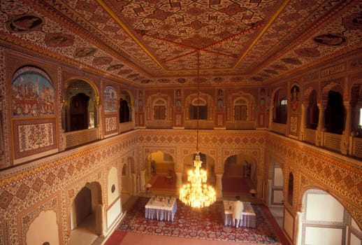 Inside the Samode Palace Hotel near the City of Jaipur in the Province of Rajasthan in India.  India, Jaipur, January, 1998